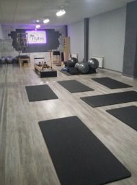Imagen de un estudio de pilates totalmente reformado por Leonesa de reformas.